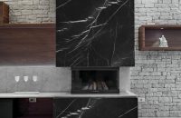 Interiors of a Modern Living Room With Fireplace Interiors of a Modern Living Room With Fireplace